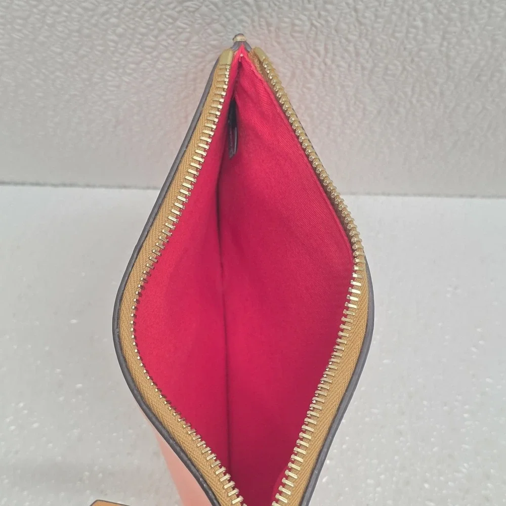 Dooney & Bourke Coral Pink Wristlet Pouch